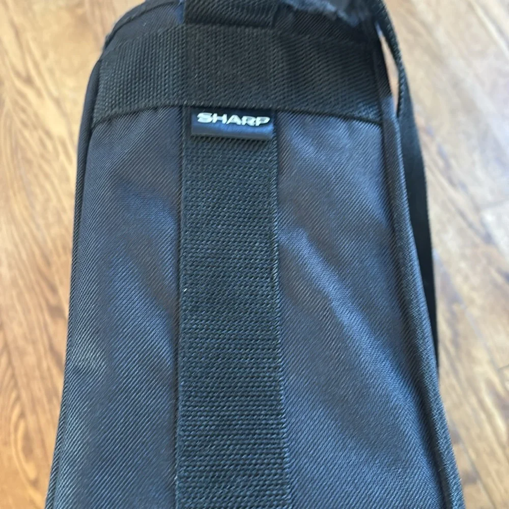 Sharp messenger bag black never used